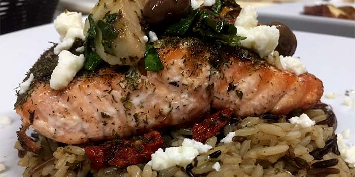 Tuscan Salmon on bed of rice served at Stevarino's Italian Eatery & Pub in Tennessee