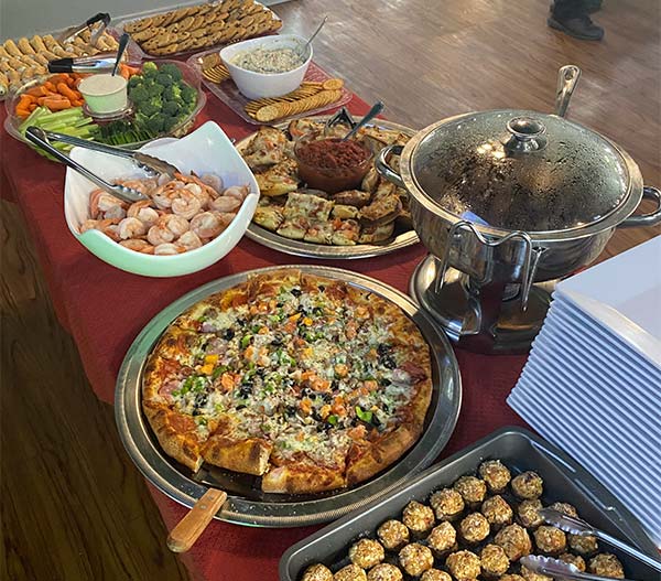 Pizza, beach bread, shrimp and appetizers catered by Stevarino's Italian Eatery & Pub in Tennessee